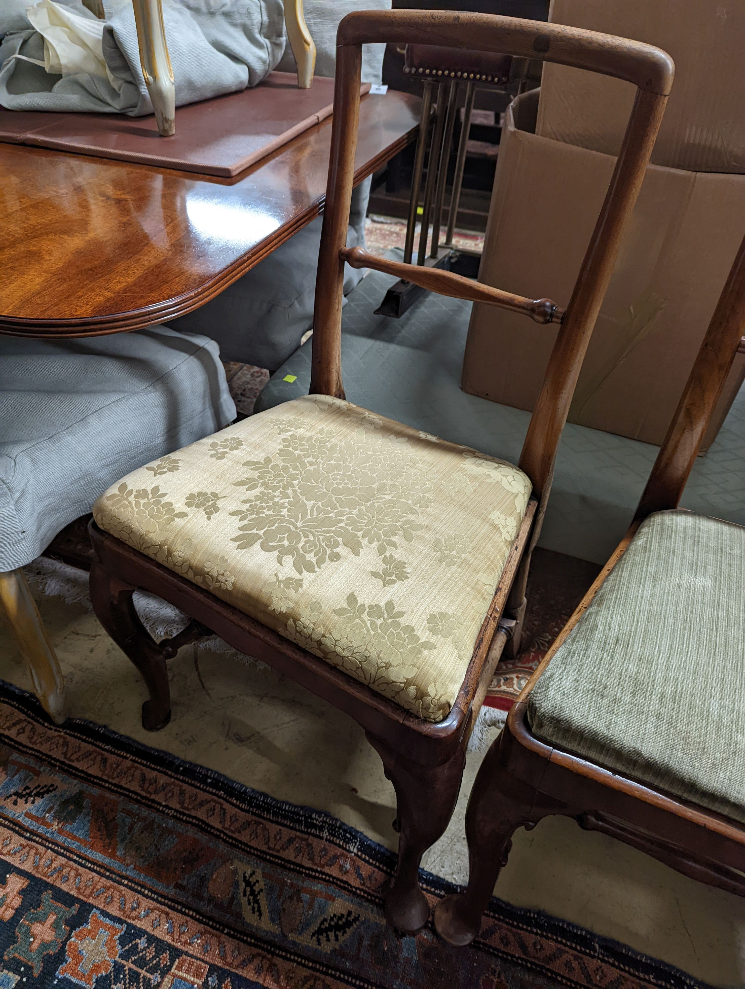 A pair of George II walnut dining chairs